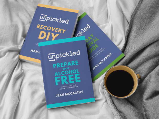 UnPickled recovery books stacked next to a mug of coffee